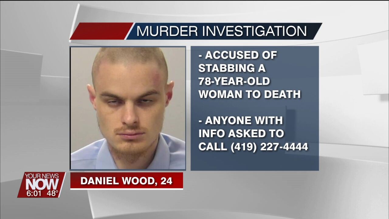 76-year-old woman found dead from multiple stab wounds, suspect in custody